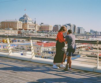 A couple looking at a landscape.